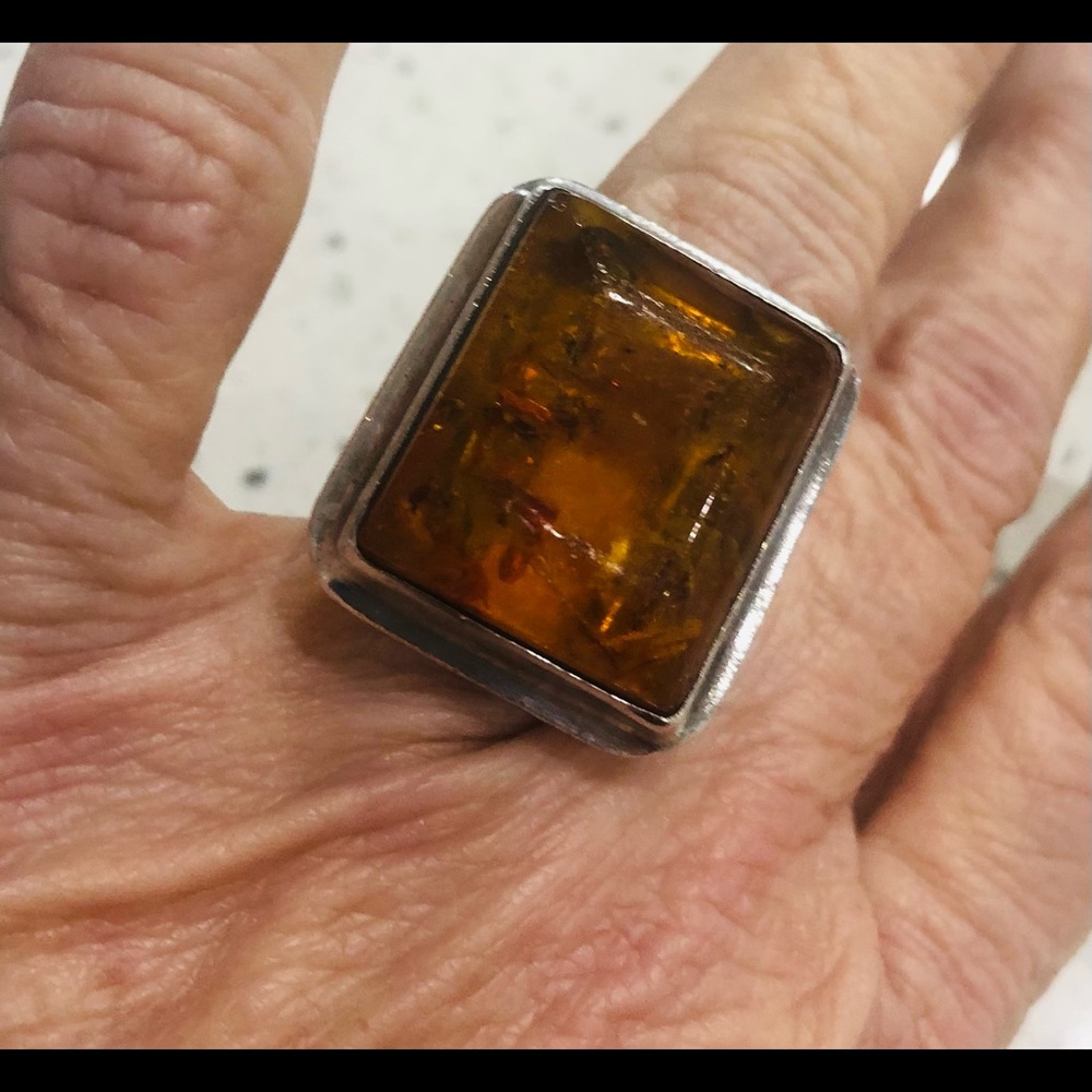 Sterling silver and prehistoric amber ring, size 6; gently used
